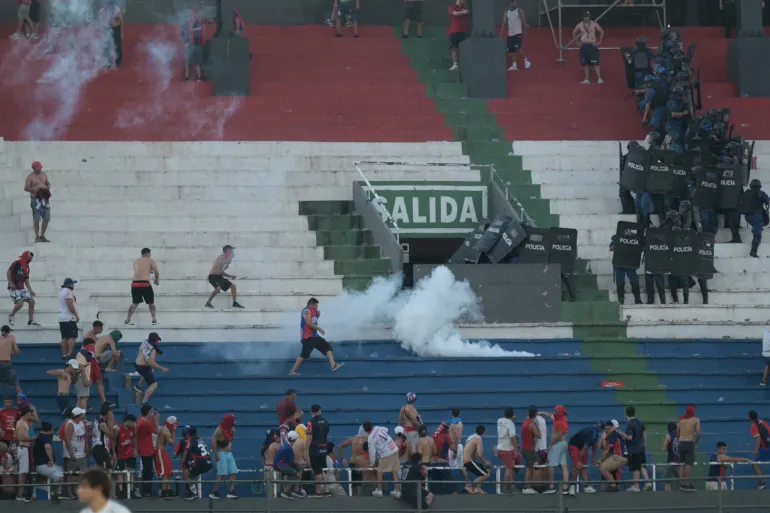 Fans clash with police in Paraguay’s Superclasico match